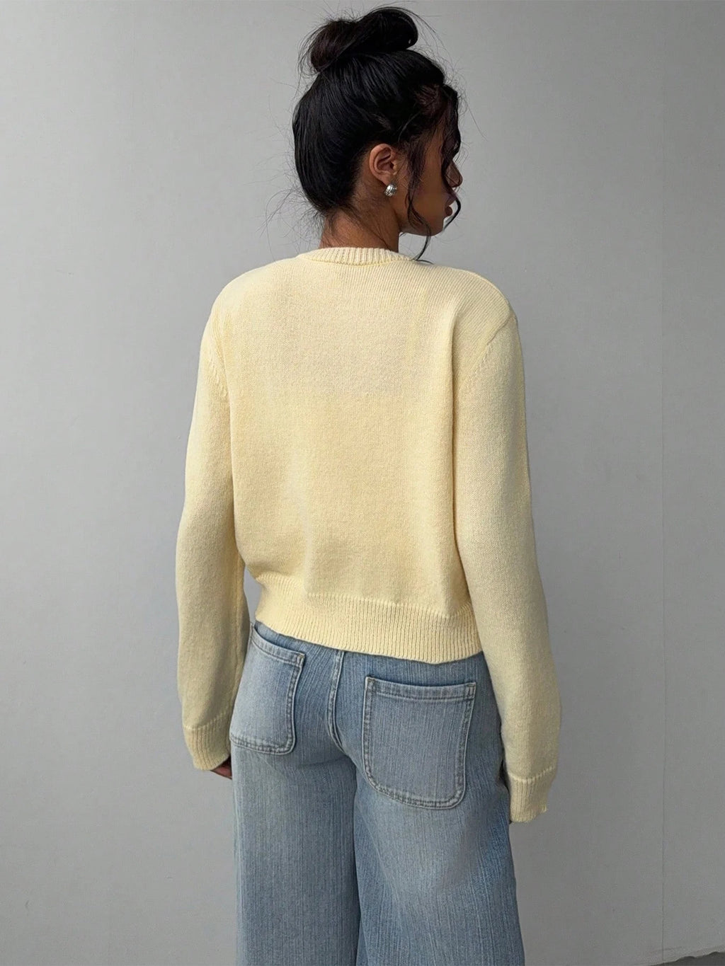 Autumn and winter new simple plain color long sleeved cardigan knitted sweater